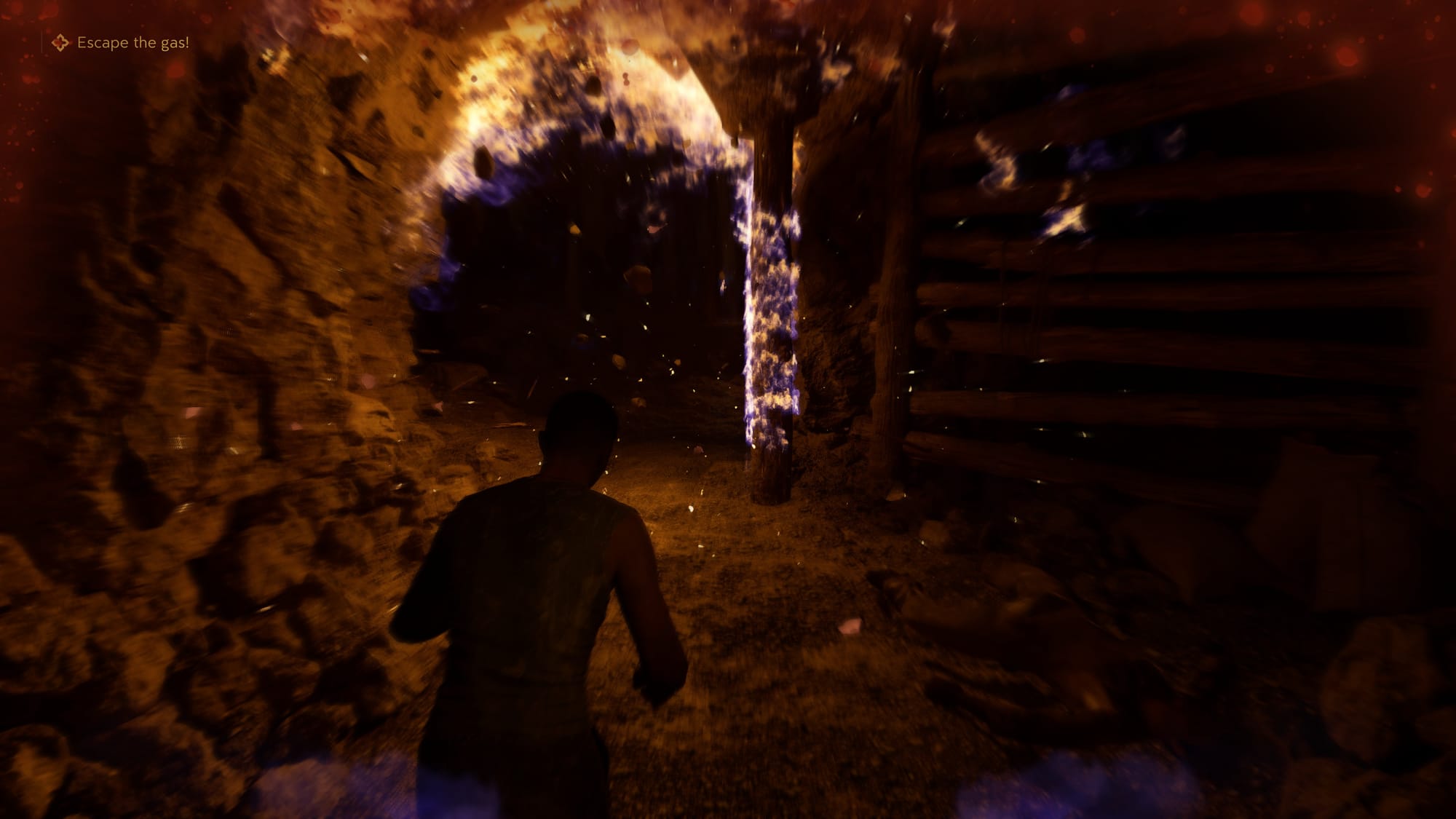 Enzo runs through a crowded, dark mine with flames exploding in foreground. There is purple VFX on the screen making the sequence feel hazy.